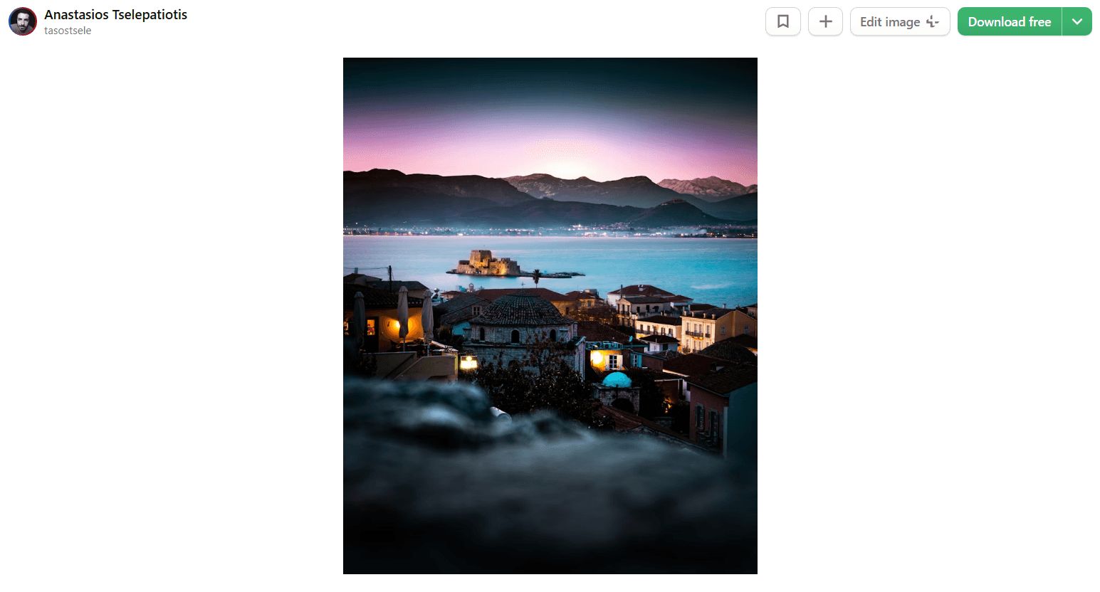 Nafplio and the Bourtzi castle in the Argolic Gulf at dusk, Peloponnese, Greece